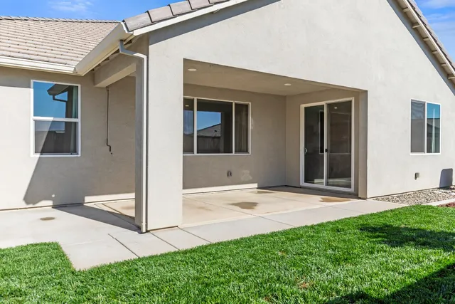 a view of a back yard of the house