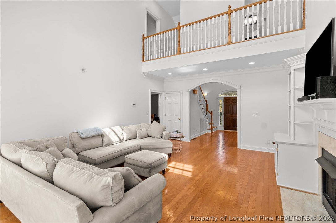 809 Kensington Park Road Fayetteville, NC 28311 - Photo 11 of 12 a living room with furniture and a flat screen tv