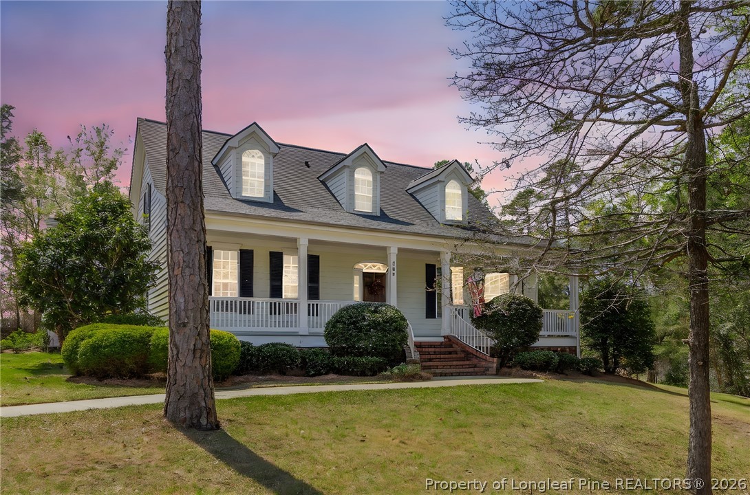809 Kensington Park Road Fayetteville, NC 28311 - Photo 12 of 12 a front view of a house with a yard
