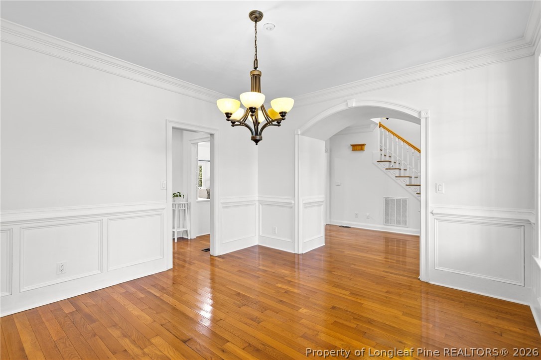 809 Kensington Park Road Fayetteville, NC 28311 - Photo 7 of 12 a view of an entryway with wooden floor
