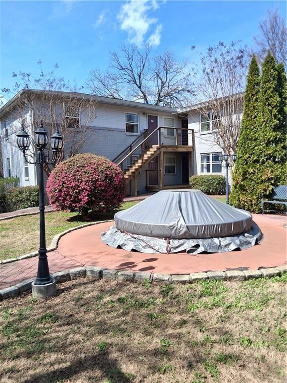 24 Daniel Street Southeast, Unit 4 Atlanta, GA 30312 - Photo 2 of 19 a view of a house with backyard and sitting area