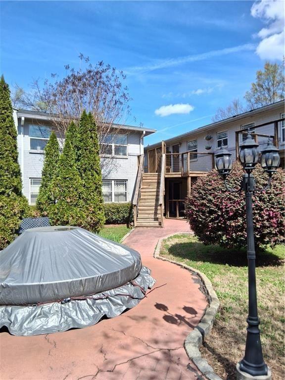 24 Daniel Street Southeast, Unit 4 Atlanta, GA 30312 - Photo 3 of 19 a front view of a house with garden