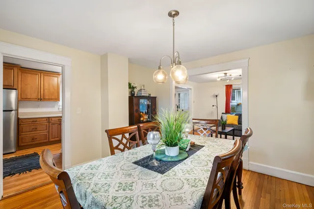 a view of a room with workspace and a window
