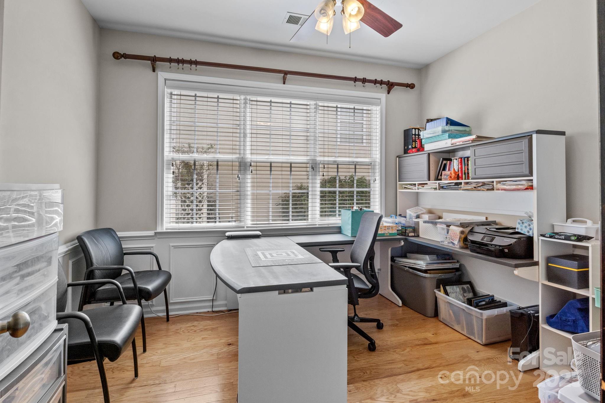 10825 Traders Court Davidson, NC 28036 - Photo 14 of 36 a view of a workspace with furniture and a window