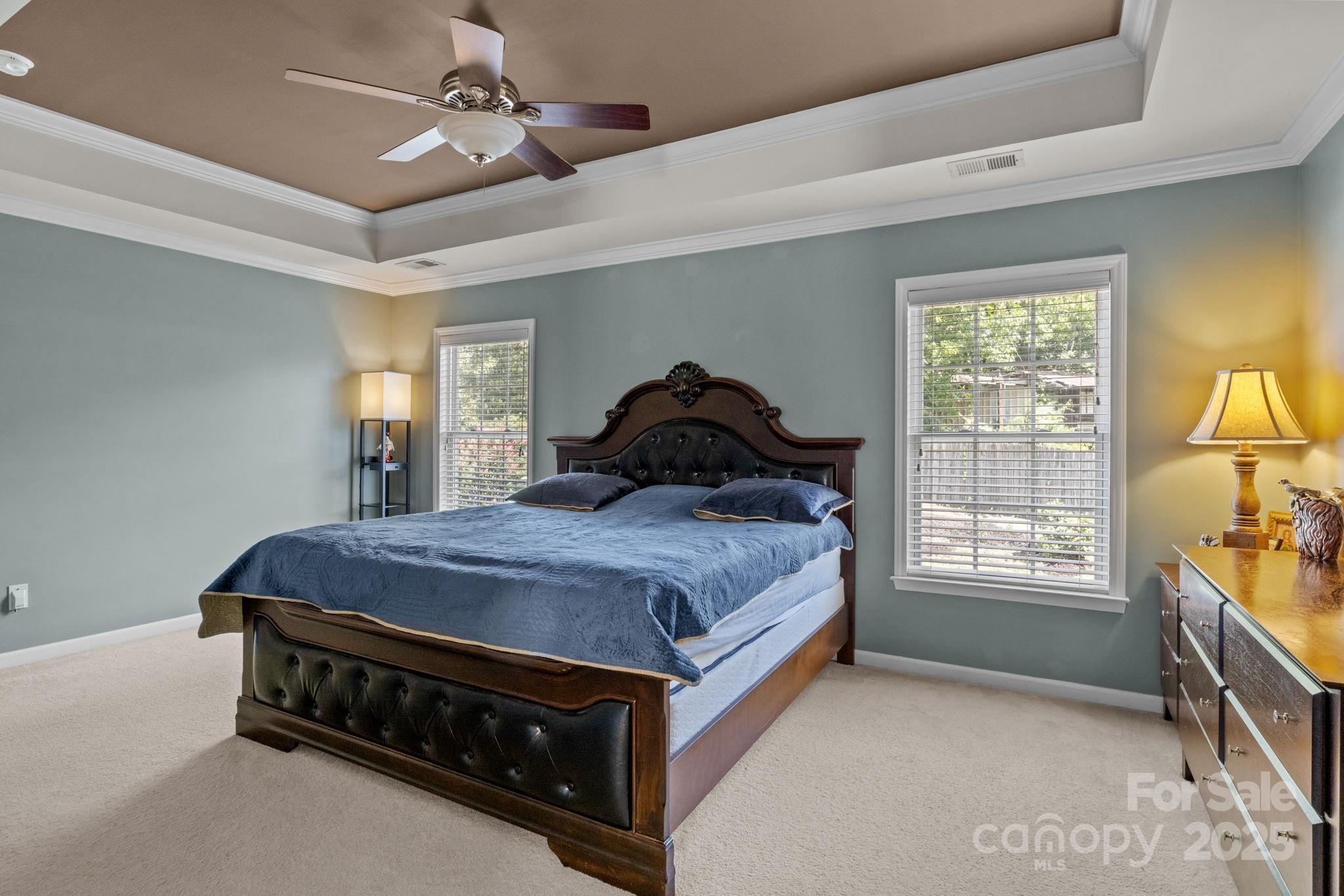 10825 Traders Court Davidson, NC 28036 - Photo 16 of 36 a bedroom with a bed and window