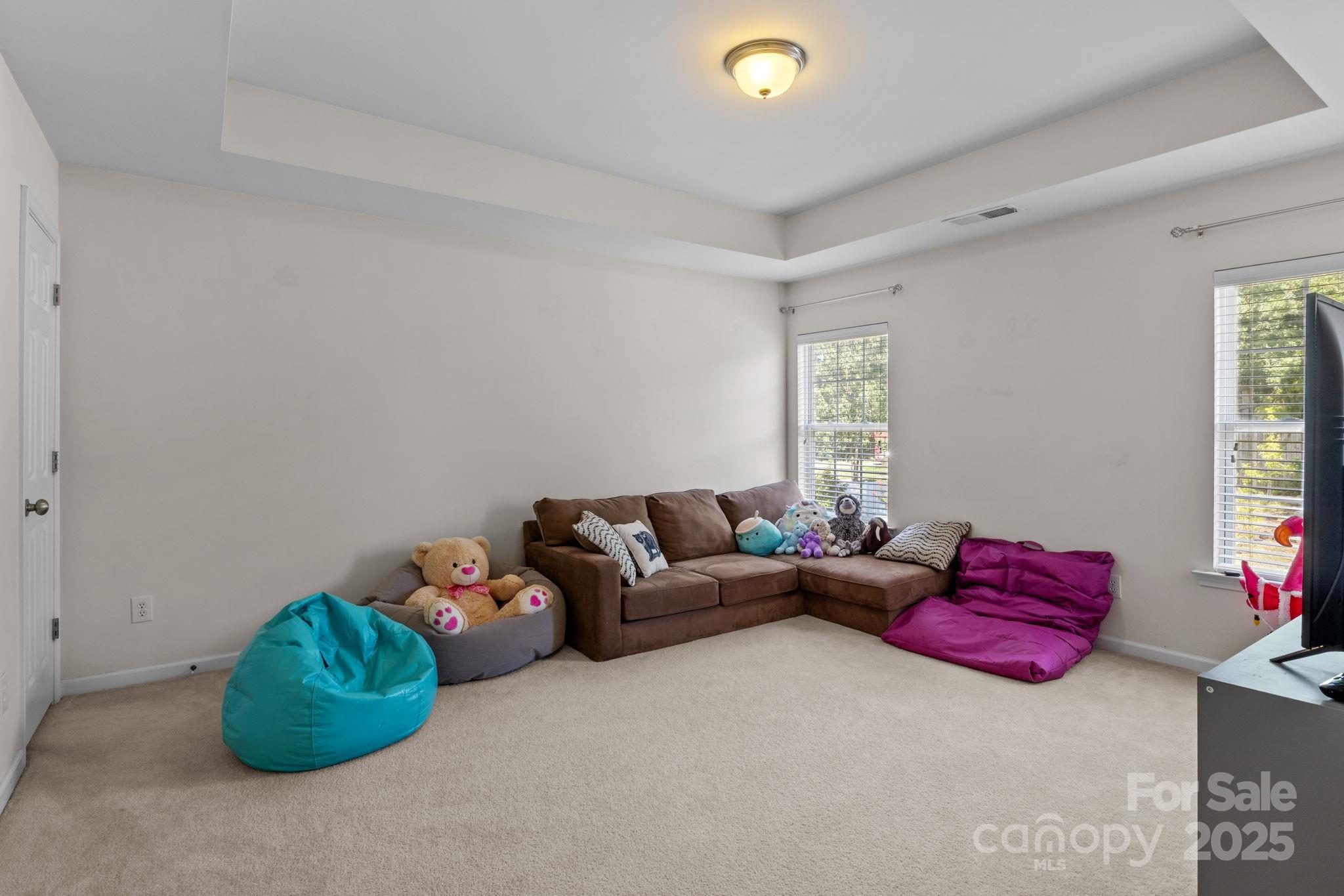 10825 Traders Court Davidson, NC 28036 - Photo 19 of 36 a living room with furniture