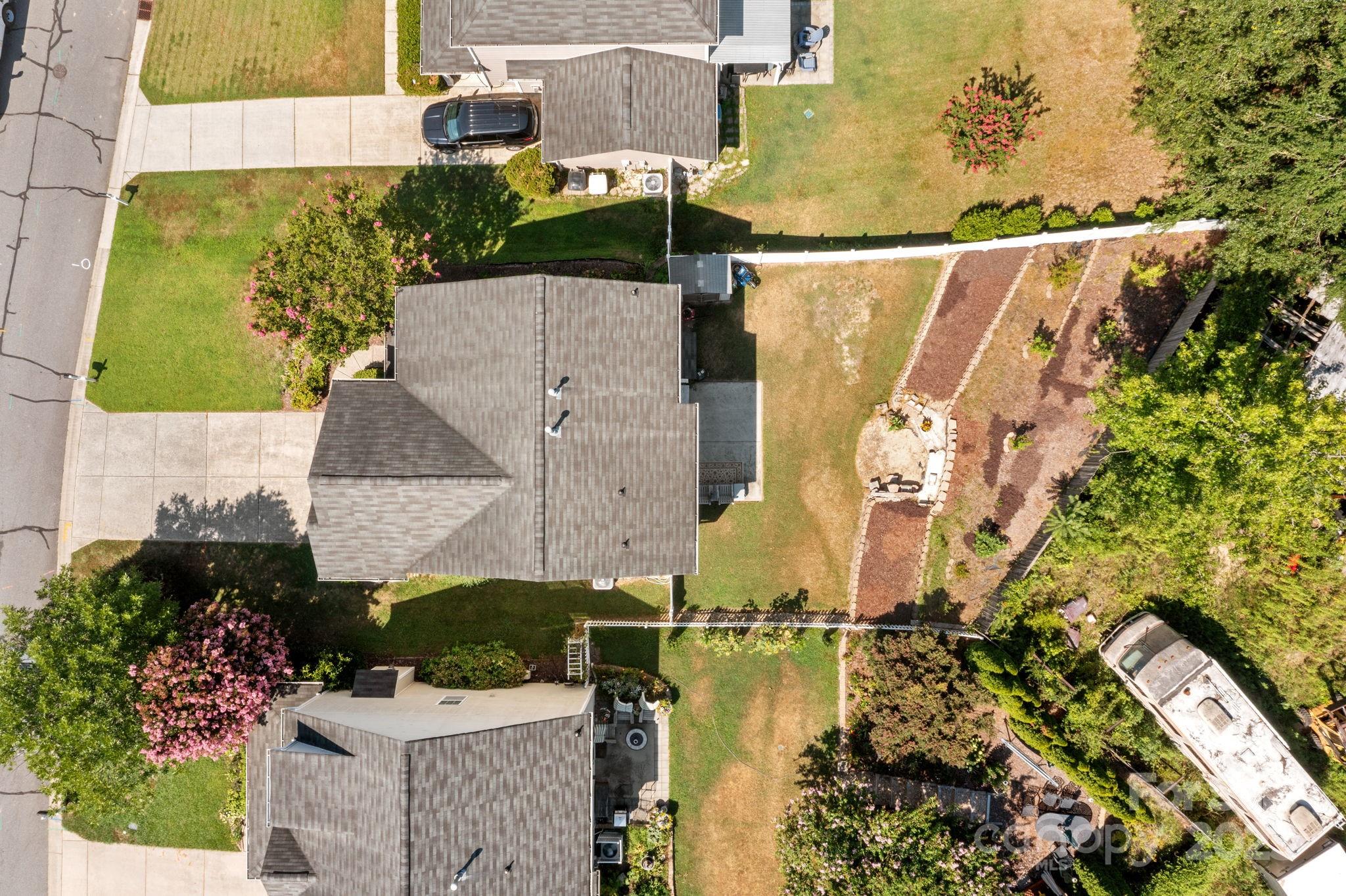 10825 Traders Court Davidson, NC 28036 - Photo 26 of 36 an aerial view of residential house with outdoor space