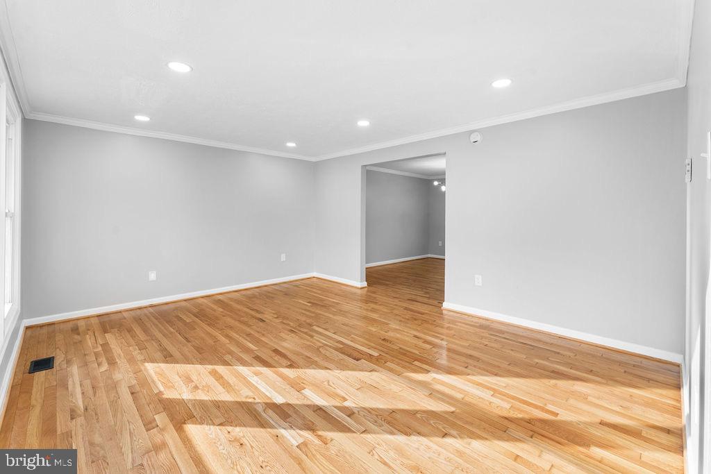 10401 Bald Hill Road Bowie, MD 20721 - Photo 12 of 44 Spacious, sunlit room with hardwood floors.
