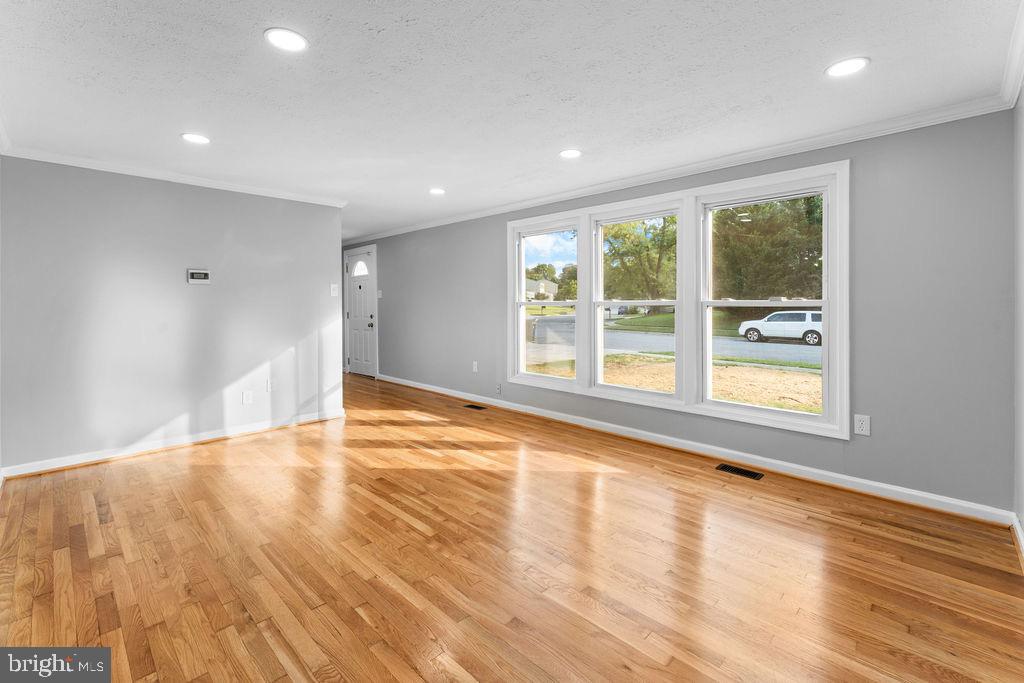 10401 Bald Hill Road Bowie, MD 20721 - Photo 14 of 44 Bright and airy living space with natural light.