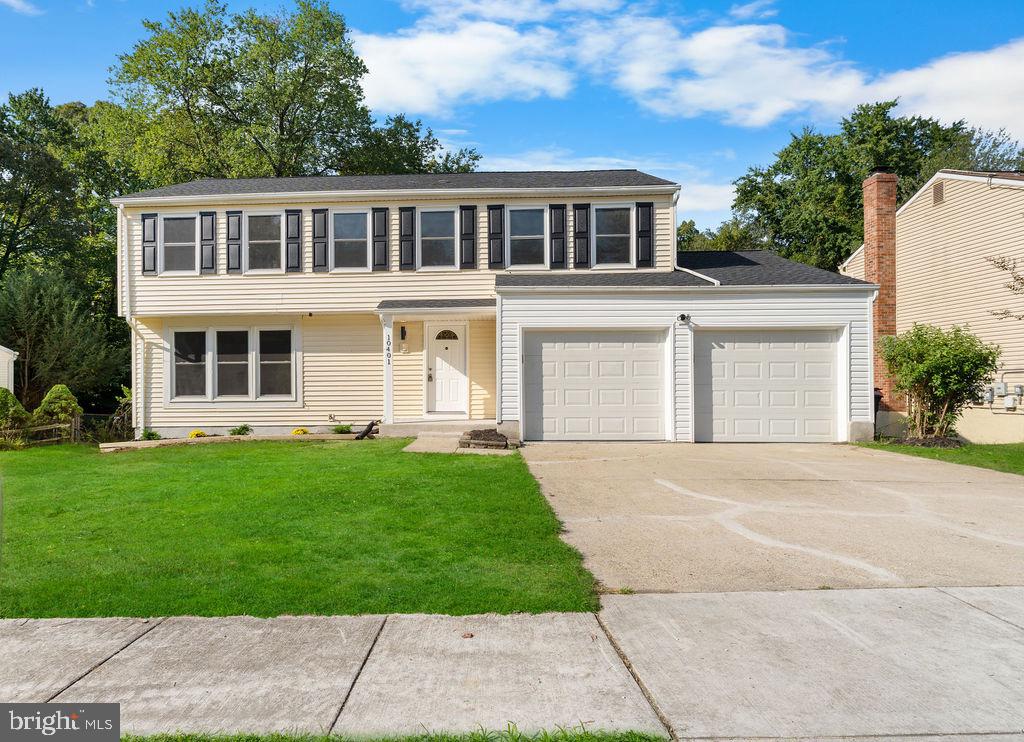 10401 Bald Hill Road Bowie, MD 20721 - Photo 2 of 44 Charming two-story home with lush greenery.