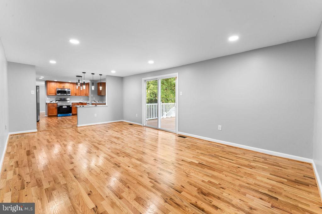 10401 Bald Hill Road Bowie, MD 20721 - Photo 24 of 44 Spacious, modern living area with natural light.