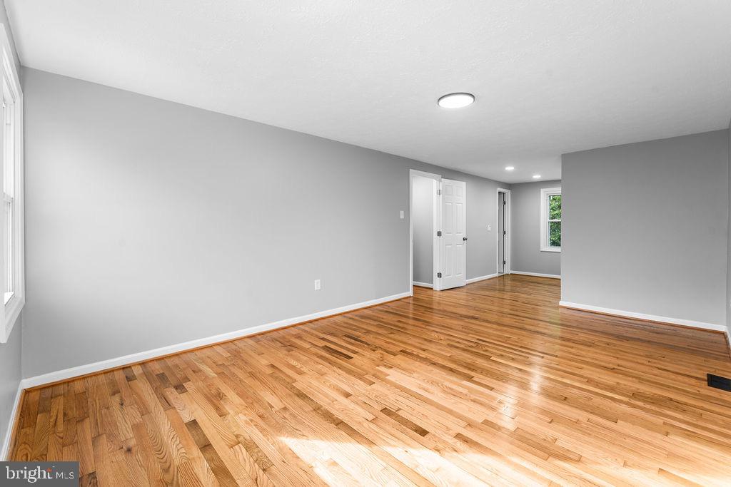 10401 Bald Hill Road Bowie, MD 20721 - Photo 28 of 44 Spacious, sunlit room with hardwood floors.