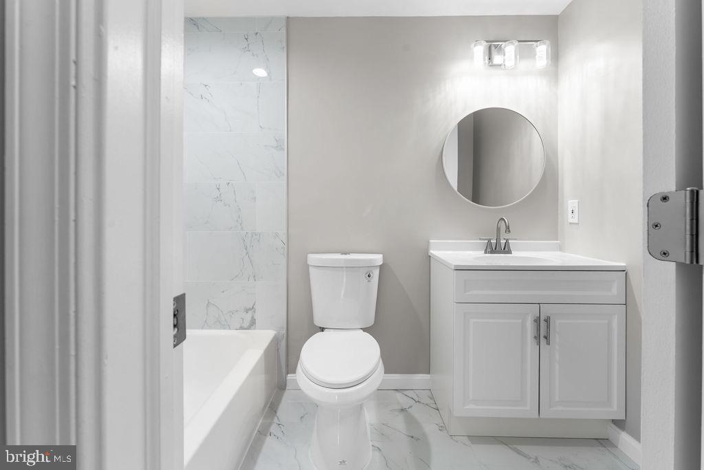 10401 Bald Hill Road Bowie, MD 20721 - Photo 31 of 44 Modern bathroom with sleek finishes.