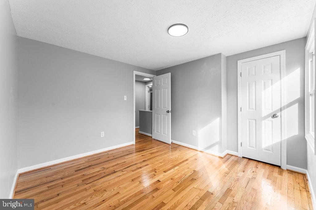 10401 Bald Hill Road Bowie, MD 20721 - Photo 34 of 44 Bright and airy space with warm wood floors.