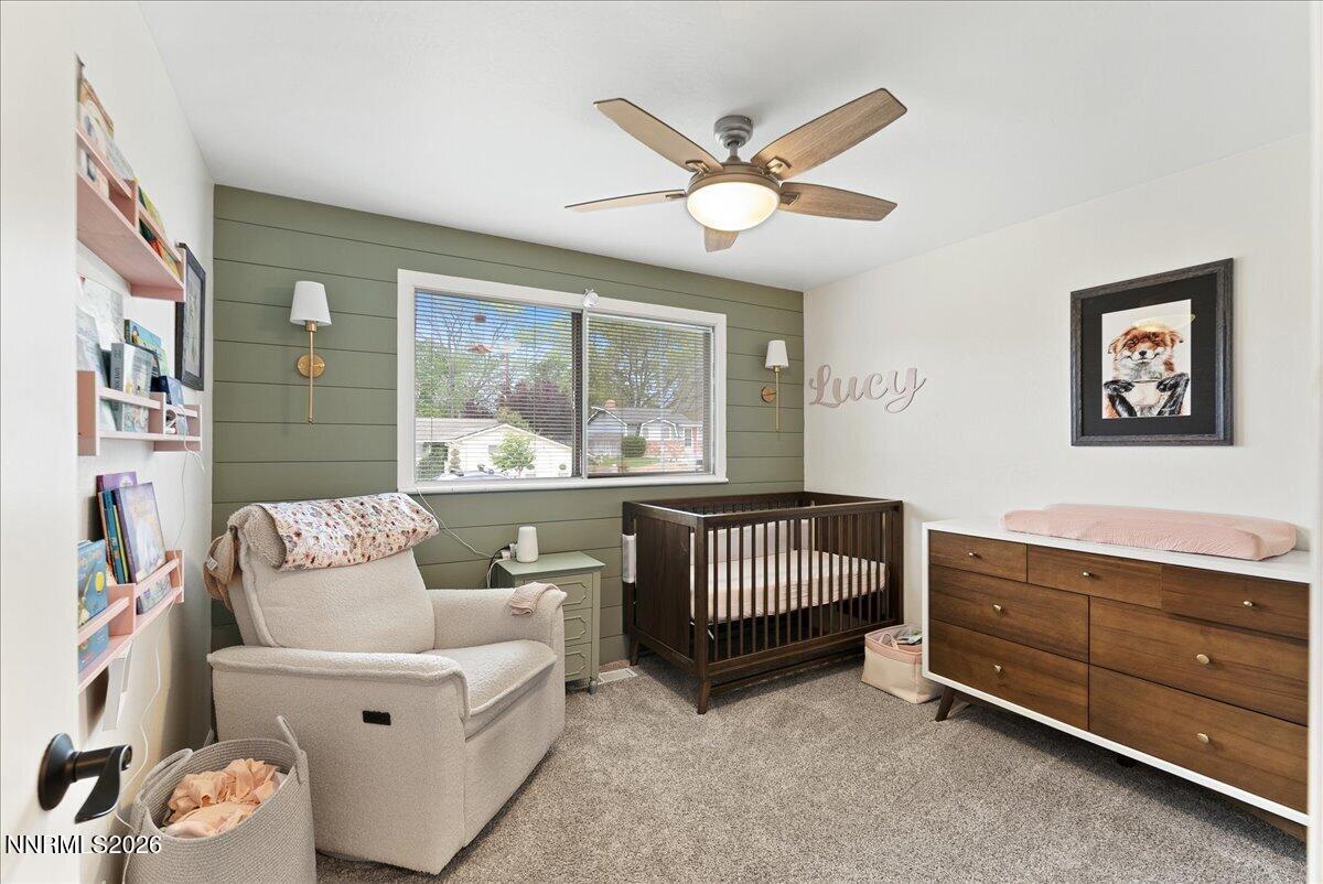 2205 Carlin Street Reno, NV 89503 - Photo 22 of 51 a bedroom with furniture and a window