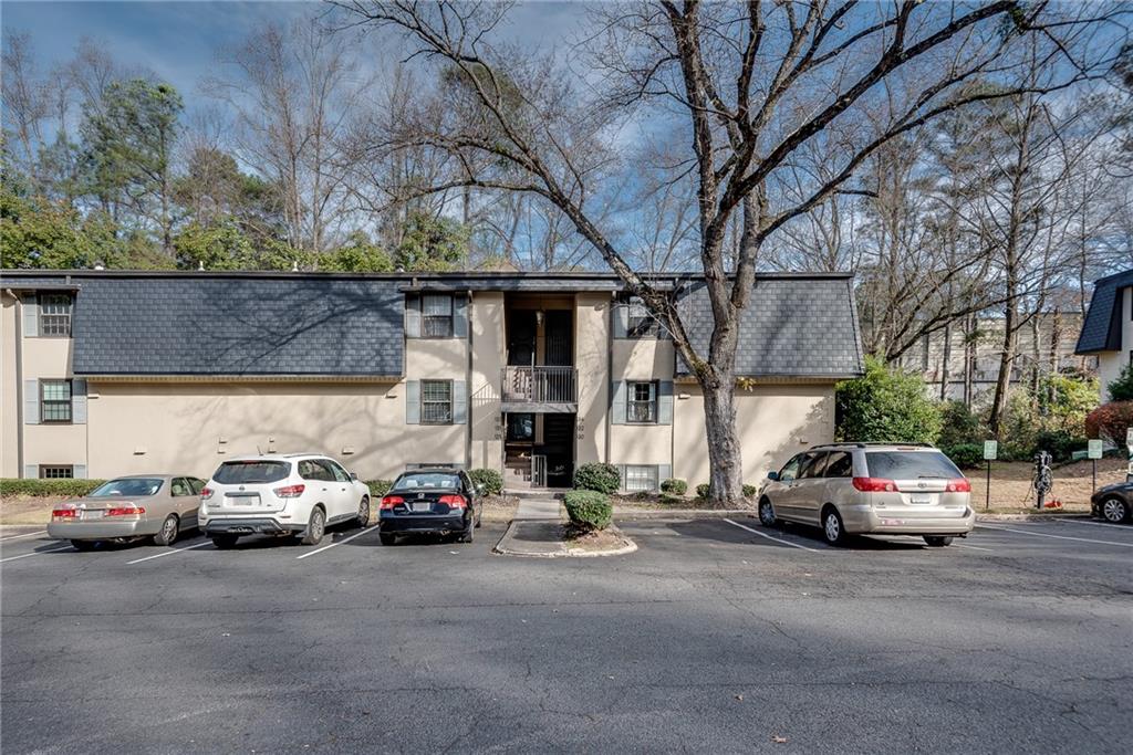 134 Lablanc Way Northwest Atlanta, GA 30327 - Photo 41 of 42 a car parked in front of a building
