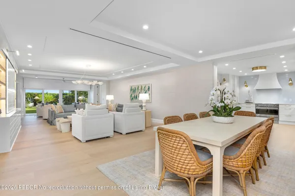 a view of a dining room with furniture and a livingroom