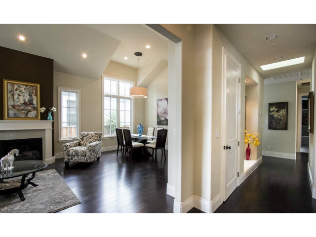 328 Middlefield Road Palo Alto, CA 94301 - Photo 2 of 14 a living room with furniture and a fireplace