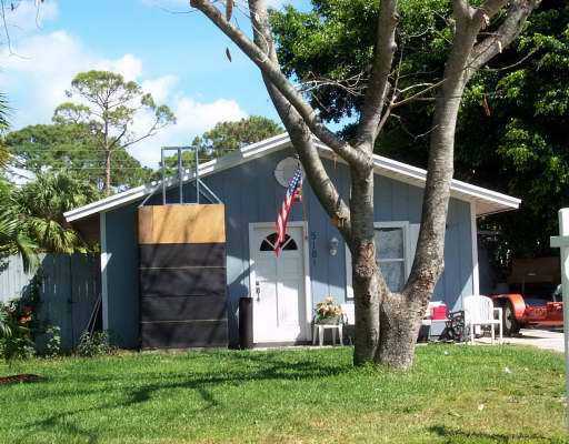 5181 Buchanan Road Delray Beach, FL 33484 - Photo 1 of 1 a front view of house with yard