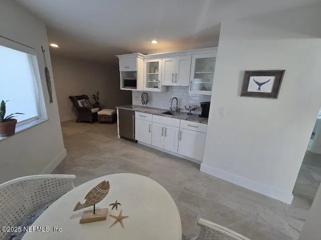 a bed room with a bed and a window