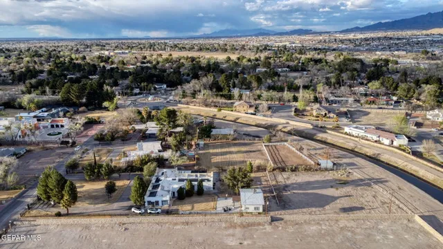 a view of swimming pool with chairs