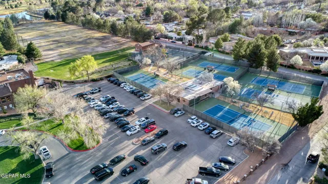 an aerial view of a house with outdoor space