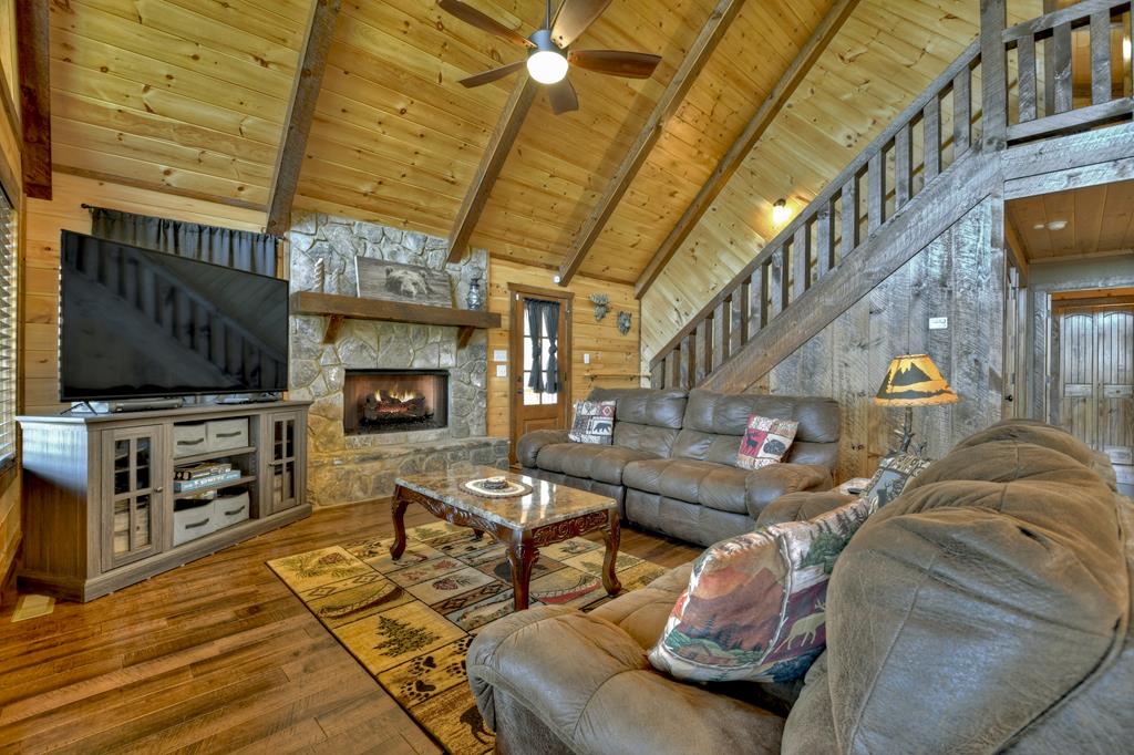 91 Heritage Way Cherry Log, GA 30522 - Photo 18 of 35 a living room with furniture and a flat screen tv