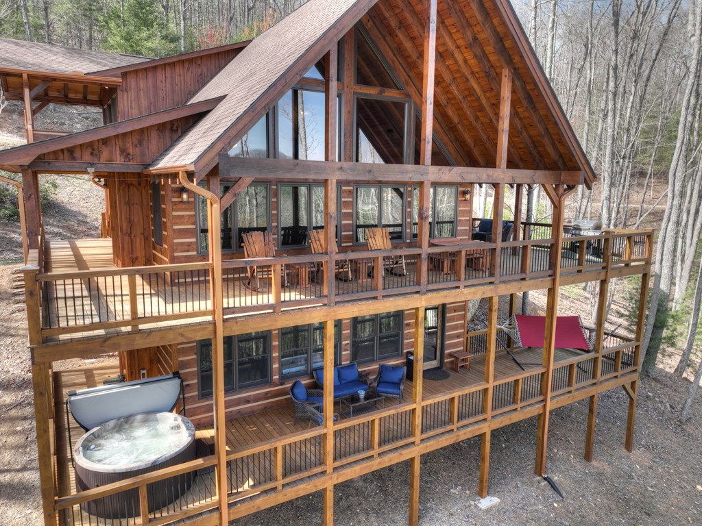 91 Heritage Way Cherry Log, GA 30522 - Photo 3 of 35 a view of a balcony with table and chairs