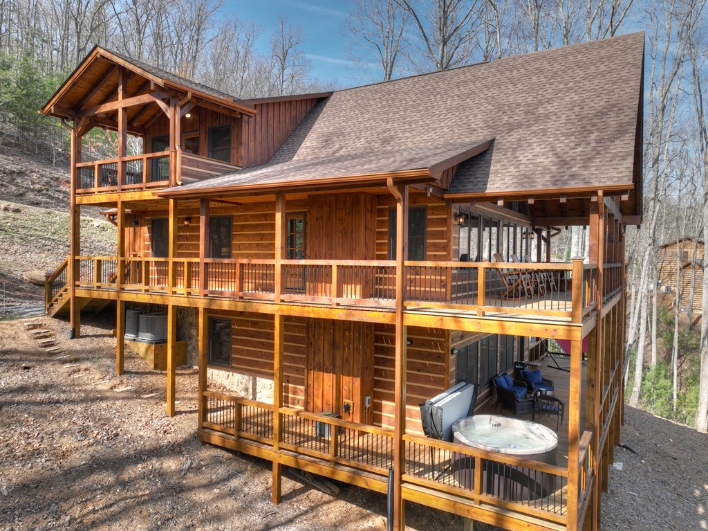 91 Heritage Way Cherry Log, GA 30522 - Photo 4 of 35 a front view of a house with a yard
