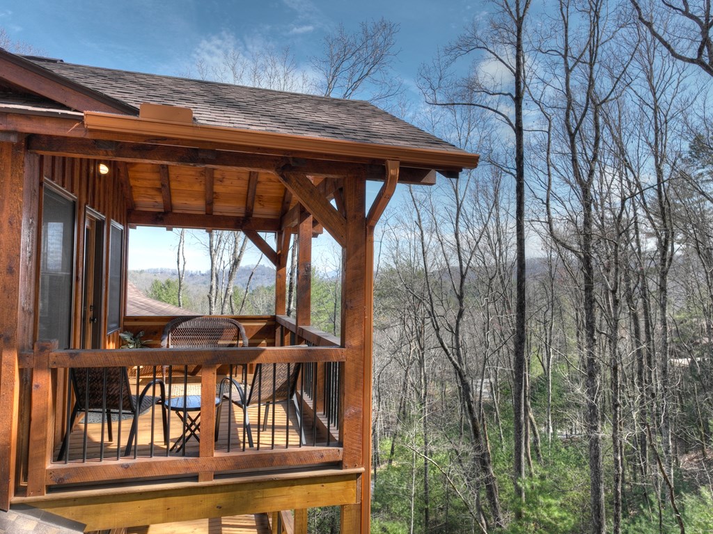 91 Heritage Way Cherry Log, GA 30522 - Photo 5 of 35 a view of porch with seating space