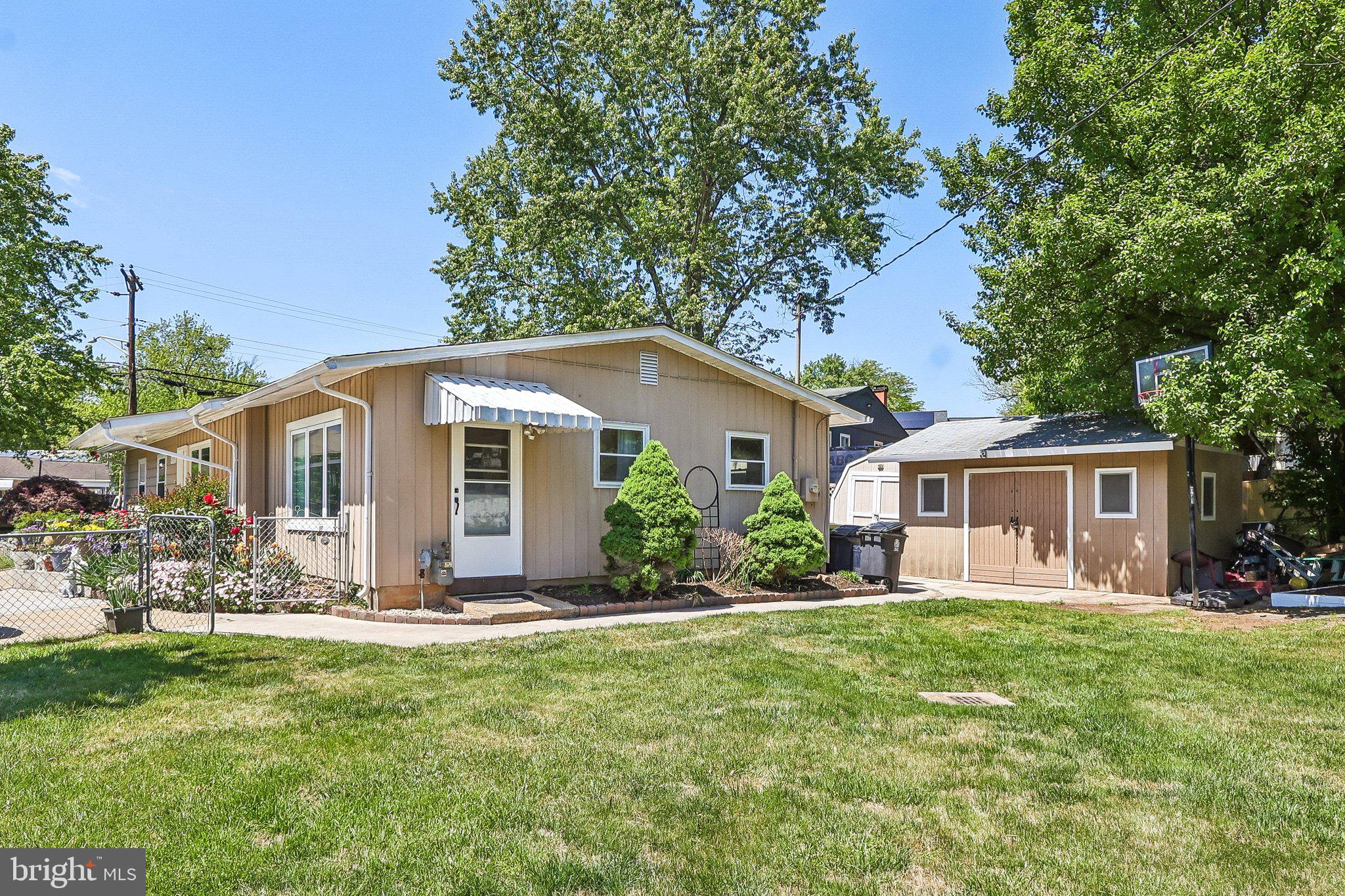 5631 Ellerbie Street Lanham, MD 20706 - Photo 35 of 41 Side Yard with Separate Entrance to Separate area