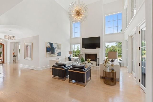 a bathroom with a sink double vanity and a mirror