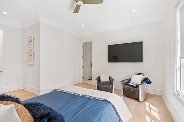 a bathroom with a granite countertop sink a mirror and a shower