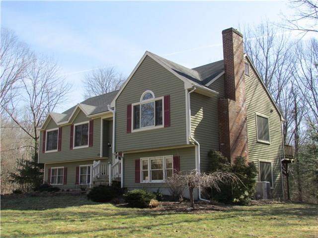 270 Beaver Dam Road Stratford, CT 06614 - Photo 1 of 1 a front view of house with yard and swimming pool