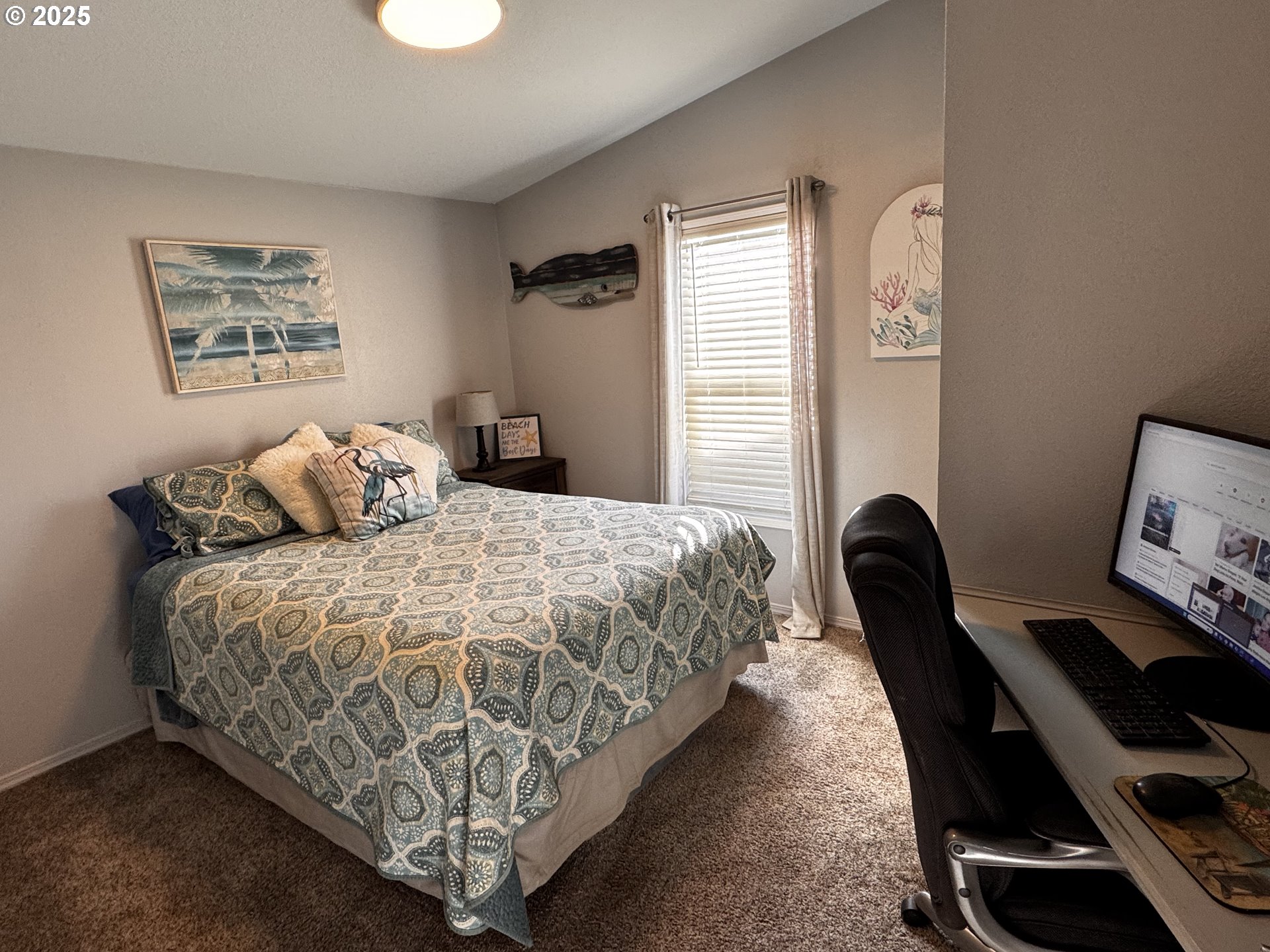 97818 Hanscam Lane Brookings, OR 97415 - Photo 12 of 44 a bedroom with bed and window