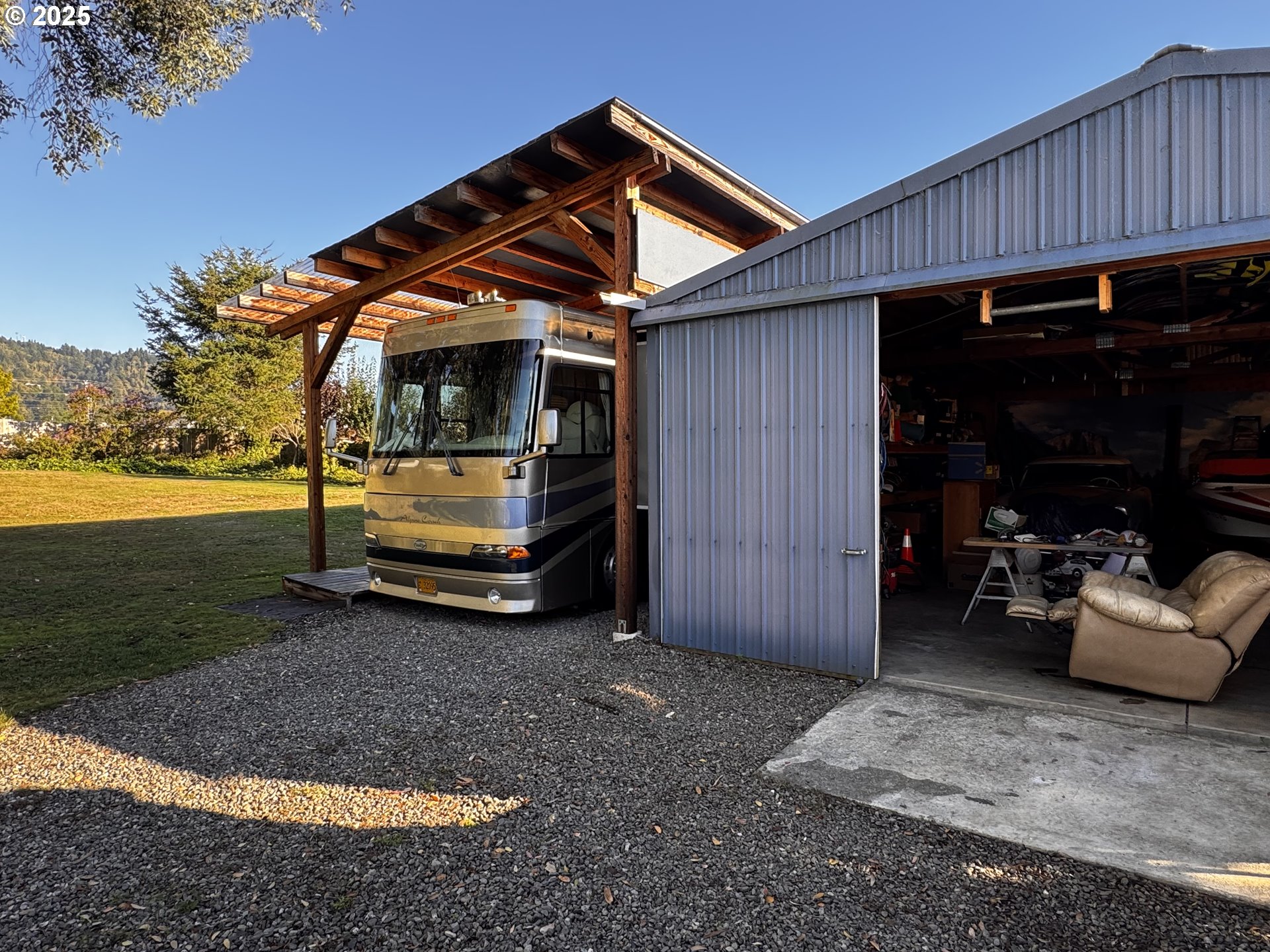 97818 Hanscam Lane Brookings, OR 97415 - Photo 27 of 44 a view of backyard with hardwood and deck