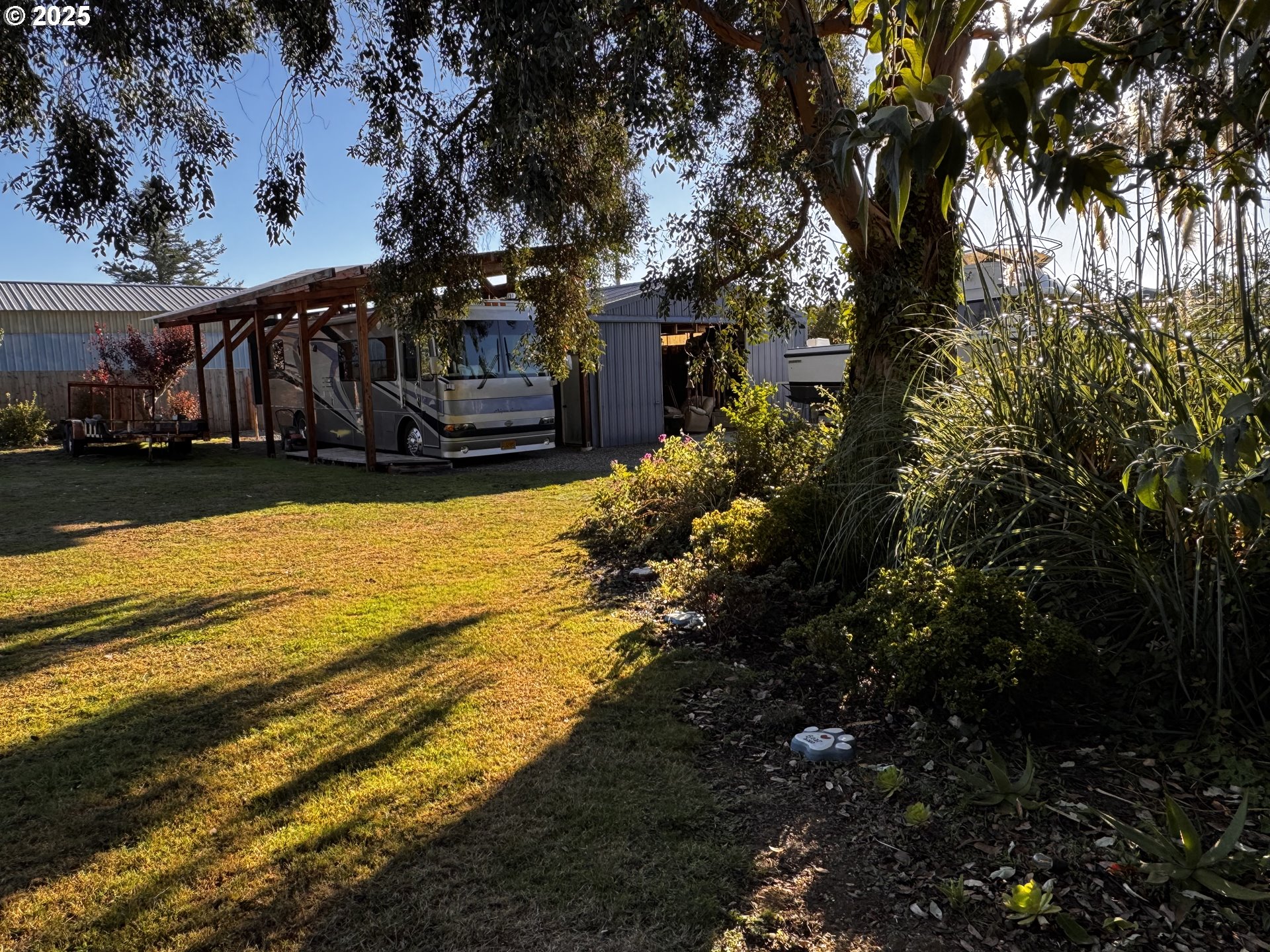 97818 Hanscam Lane Brookings, OR 97415 - Photo 29 of 44 a view of a house with a yard