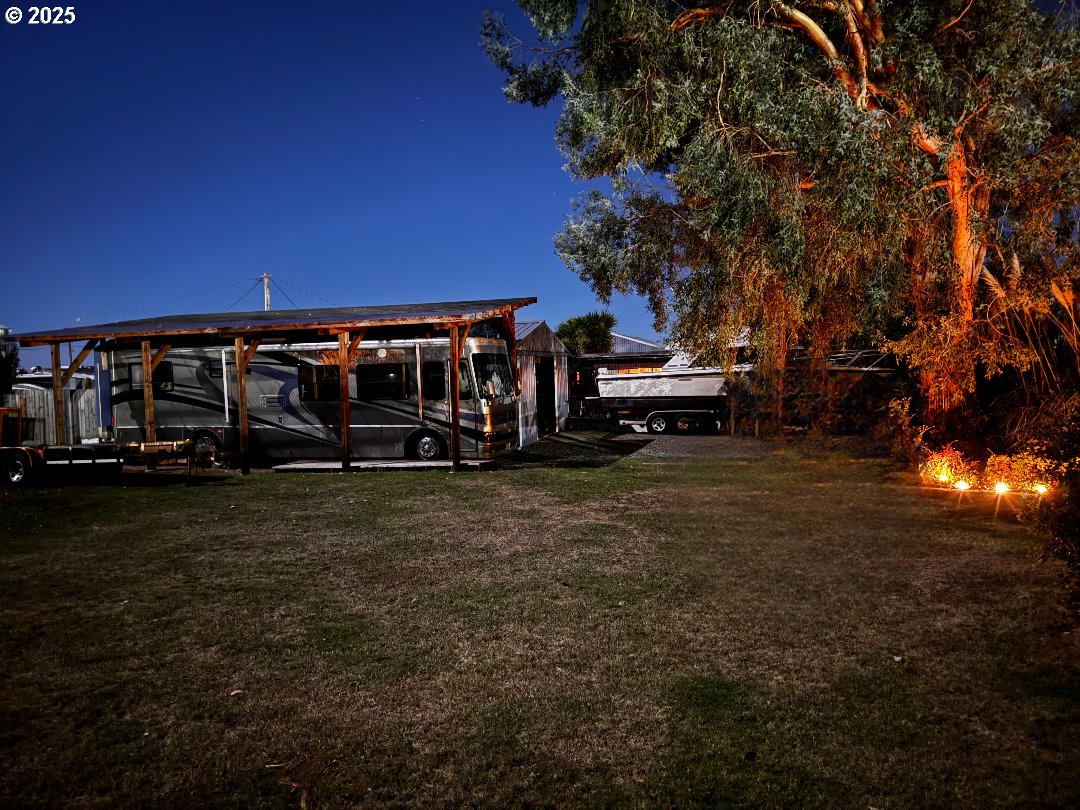 97818 Hanscam Lane Brookings, OR 97415 - Photo 33 of 44 a view of a house with a yard