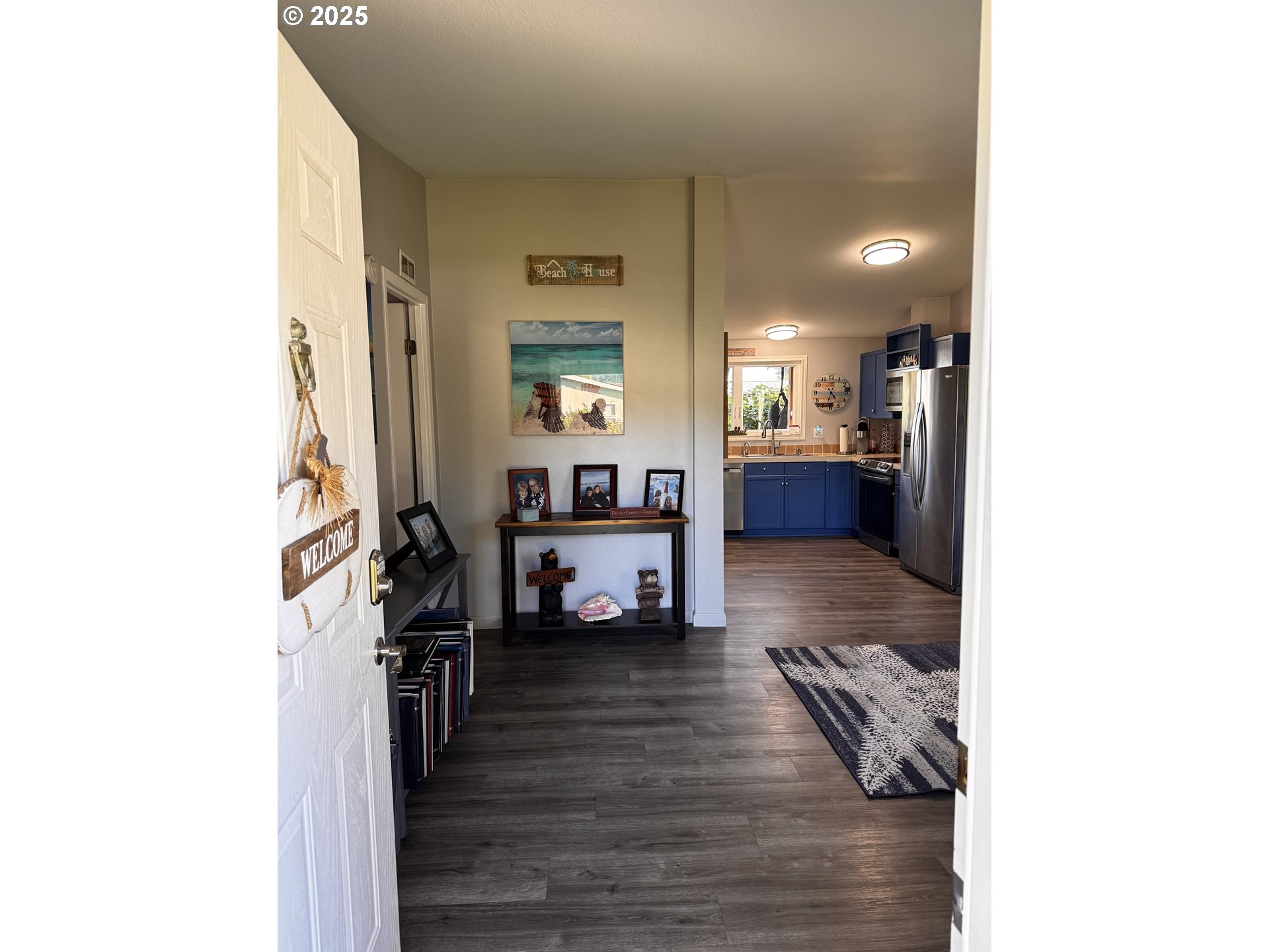 97818 Hanscam Lane Brookings, OR 97415 - Photo 5 of 44 a living room with furniture and a wooden floor