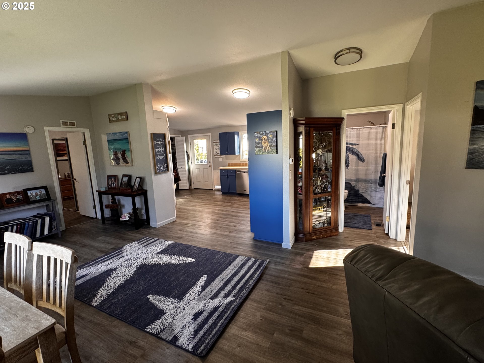 97818 Hanscam Lane Brookings, OR 97415 - Photo 6 of 44 a living room with furniture and a rug