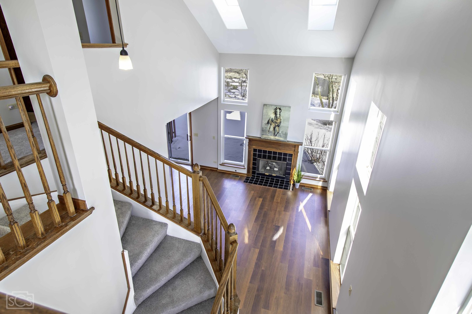 14 Peach Tree Court Algonquin, IL 60102 - Photo 13 of 20 a view of stairs and hallway with wooden floor