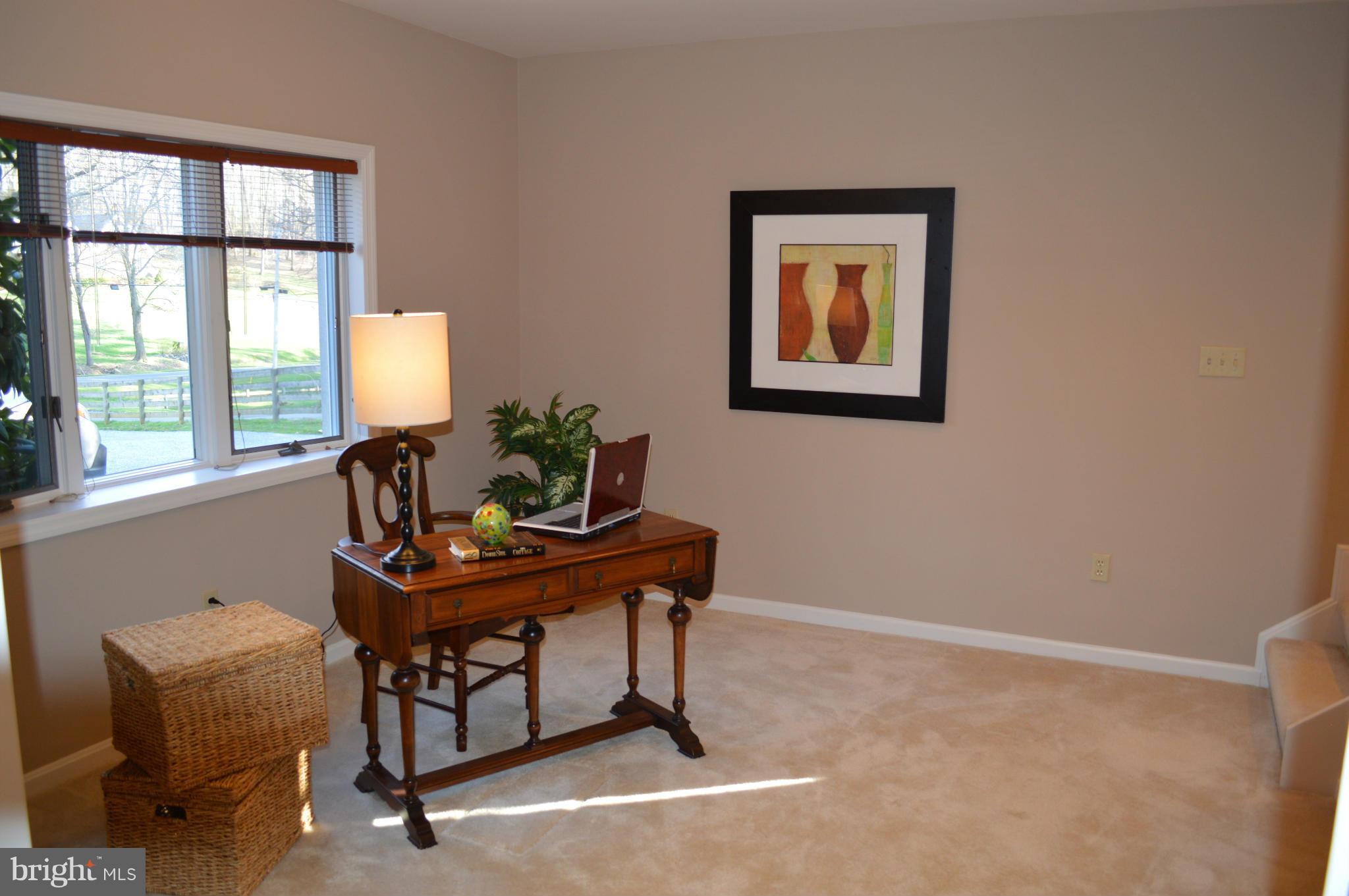 22524 Shiloh Church Road Boyds, MD 20841 - Photo 9 of 20 a workspace with furniture and a window