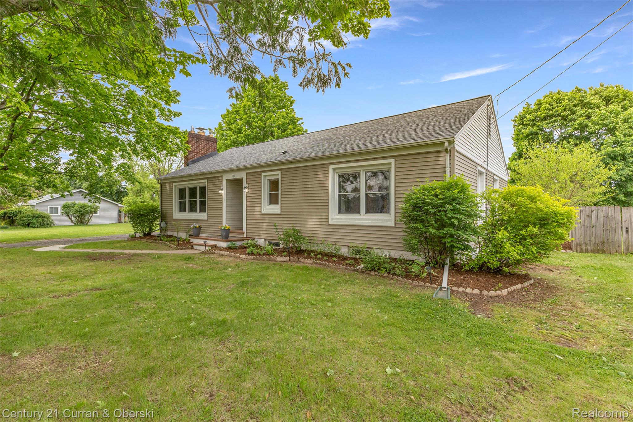 411 South Adrian Street Tecumseh, MI 49286 - Photo 47 of 61 Single story home with a chimney