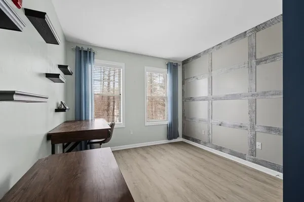 a room with furniture and a window