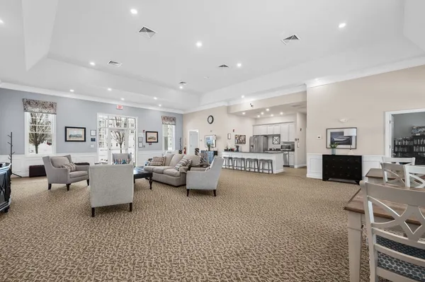 a room with gym equipment and a flat screen tv