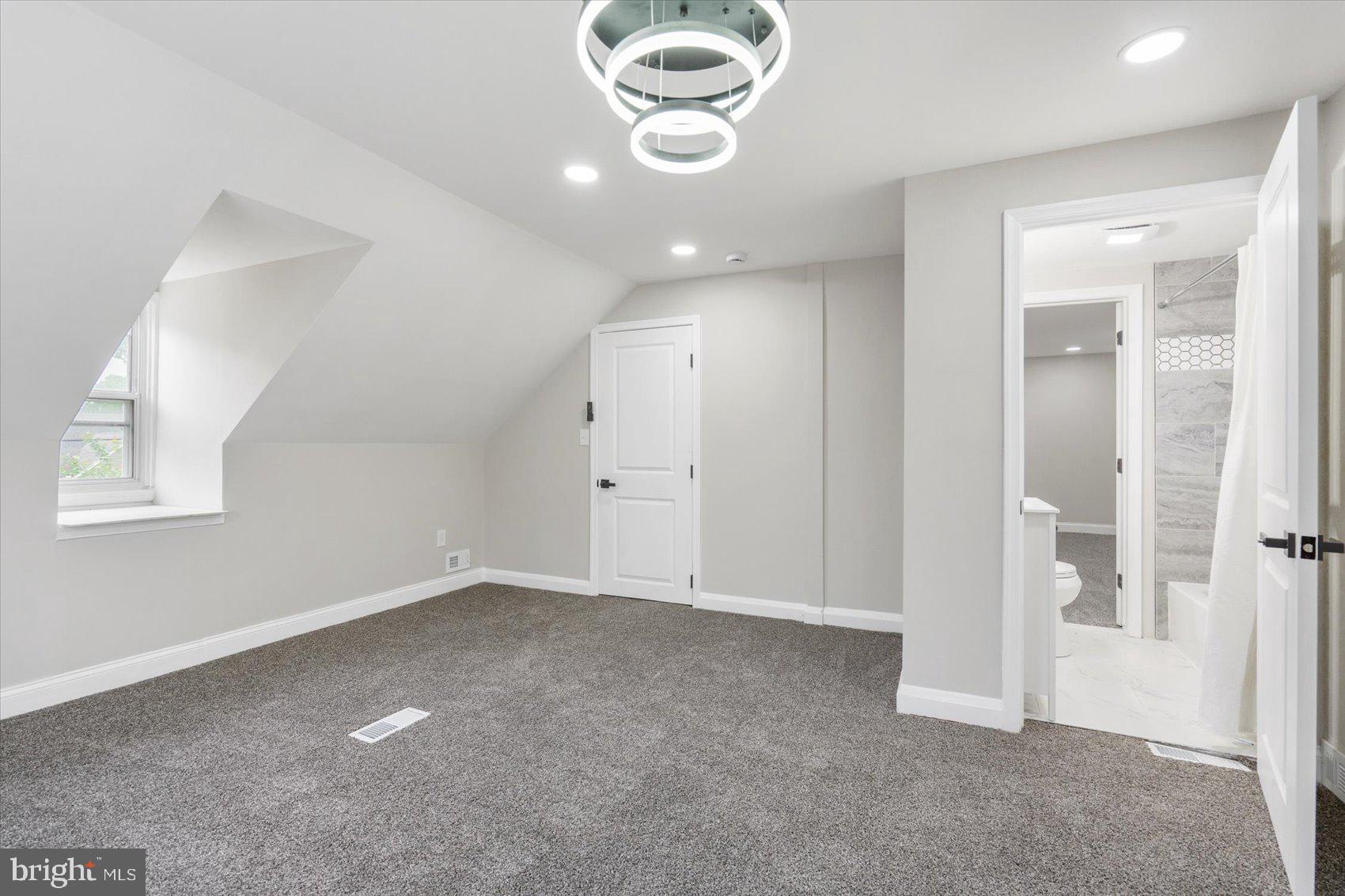 8121 Hillendale Road Parkville, MD 21234 - Photo 29 of 47 an empty room with windows and closet