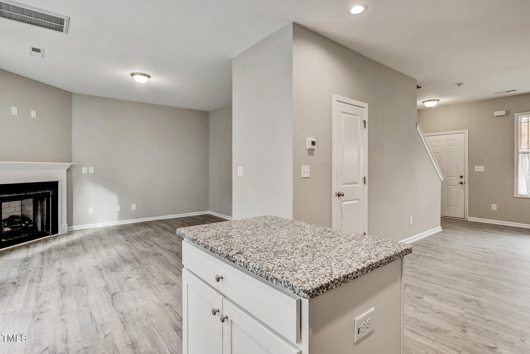 67 Stewarts Knob Drive Clayton, NC 27527 - Photo 8 of 26 a bathroom with a granite countertop sink and a mirror