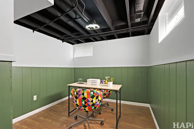 a room with furniture and a potted plant