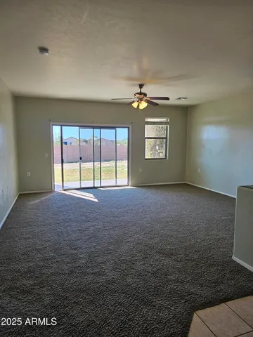 a room with a bed and a window