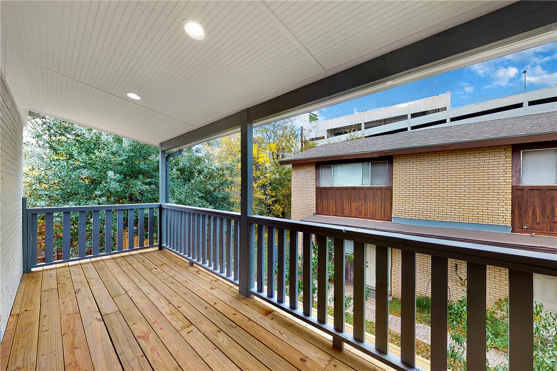 513 Boyett Street, Unit 2 College Station, TX 77840 - Photo 15 of 22 a view of balcony with wooden floor
